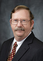 Dr. Bruce M.  Whitney